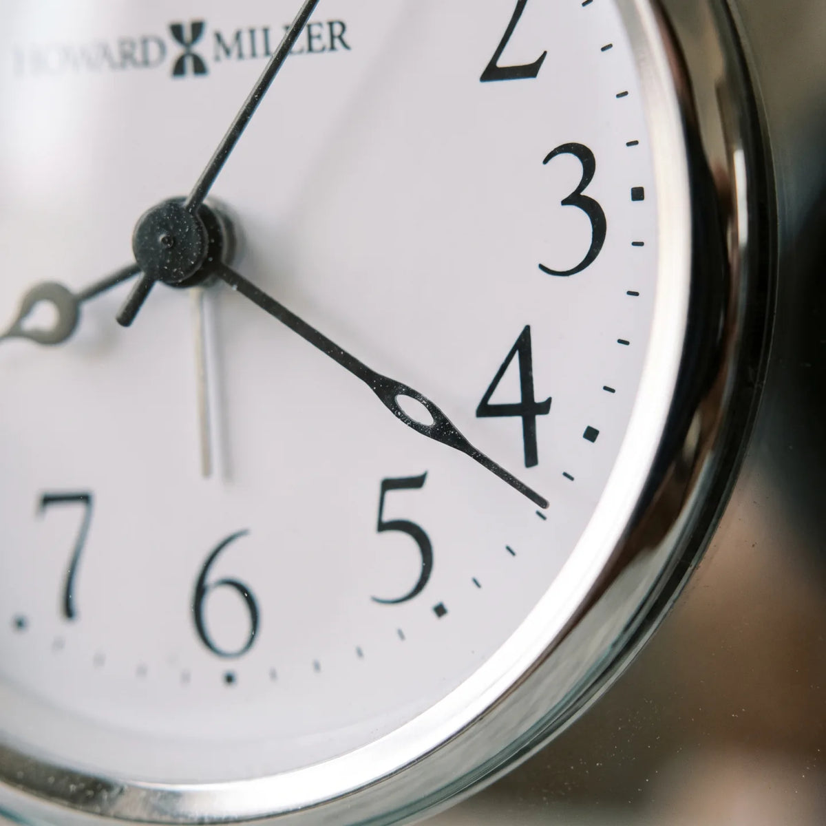 Howard Miller Aden Tabletop Clock, macro close-up of the hands and dial