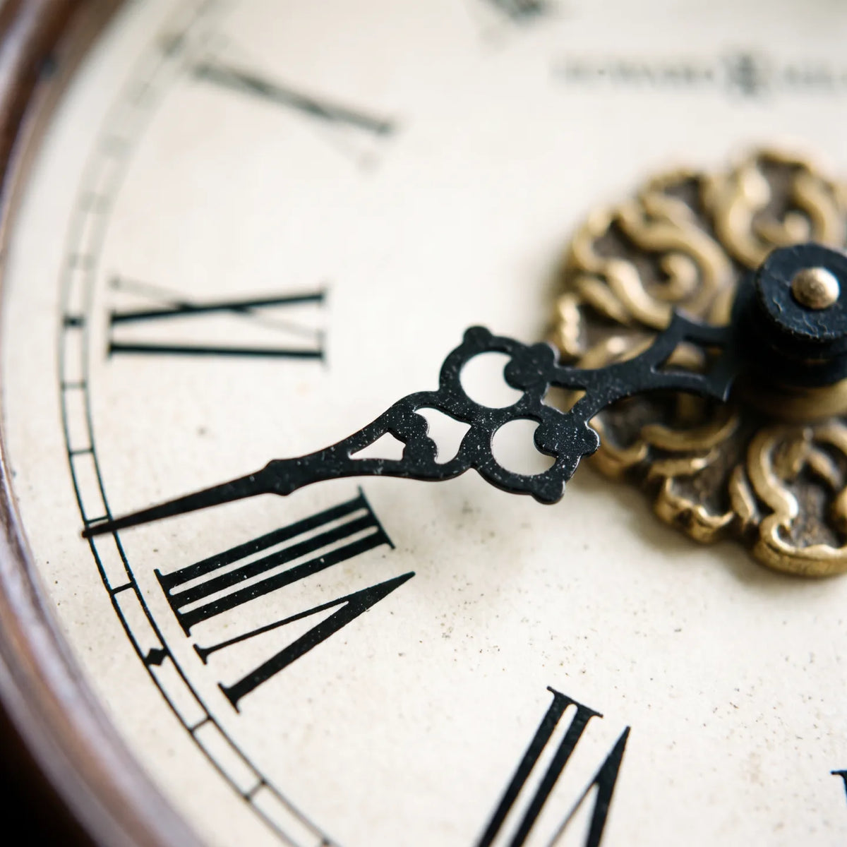 Howard Miller Andrea Mantel Clock, macro close-up of the hands and dial