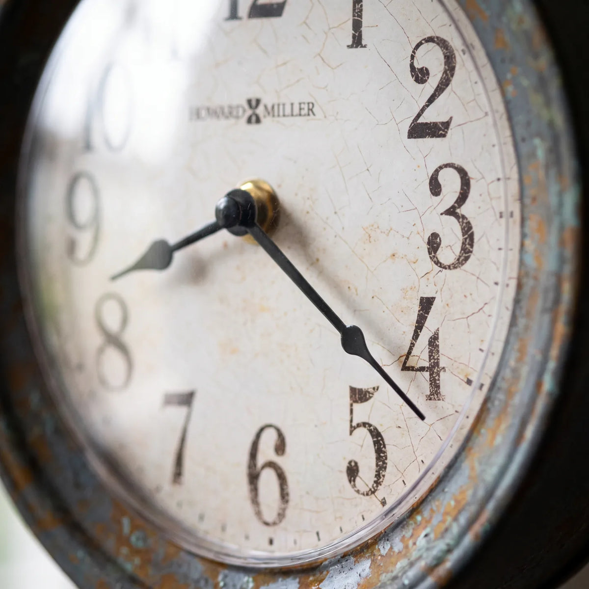 Howard Miller Ardie Mantel Clock, macro close-up of the hands and dial