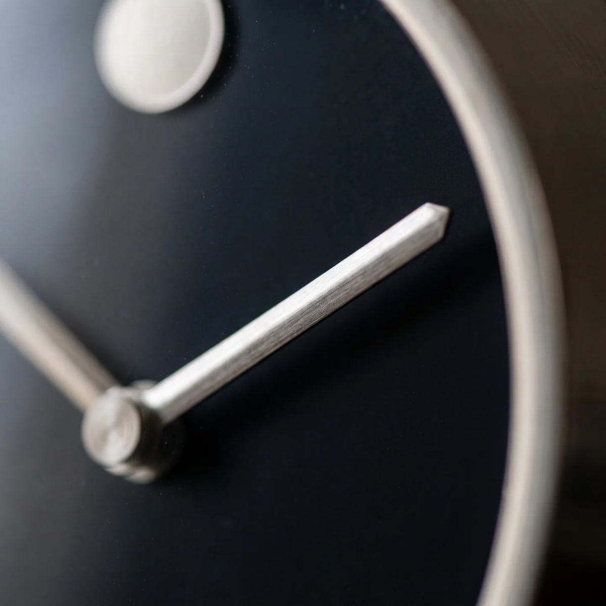 Howard Miller Aurora Tabletop Clock, macro close-up of the hands and dial