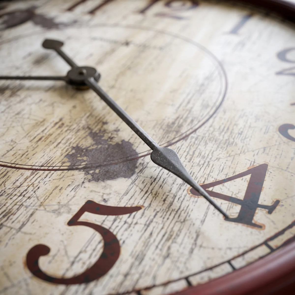 Howard Miller Back 40 Wall Clock, macro close-up of the hands and dial