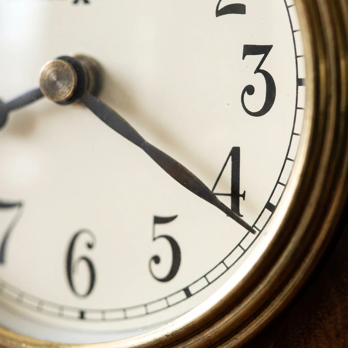 Howard Miller Baxter Tabletop Clock, macro close-up of the hands and dial
