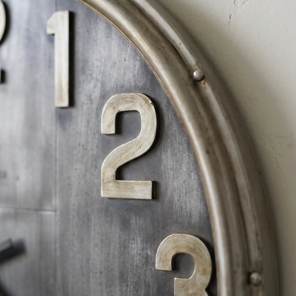 Howard Miller Bender Gallery Wall Clock, macro close-up of the hands and dial