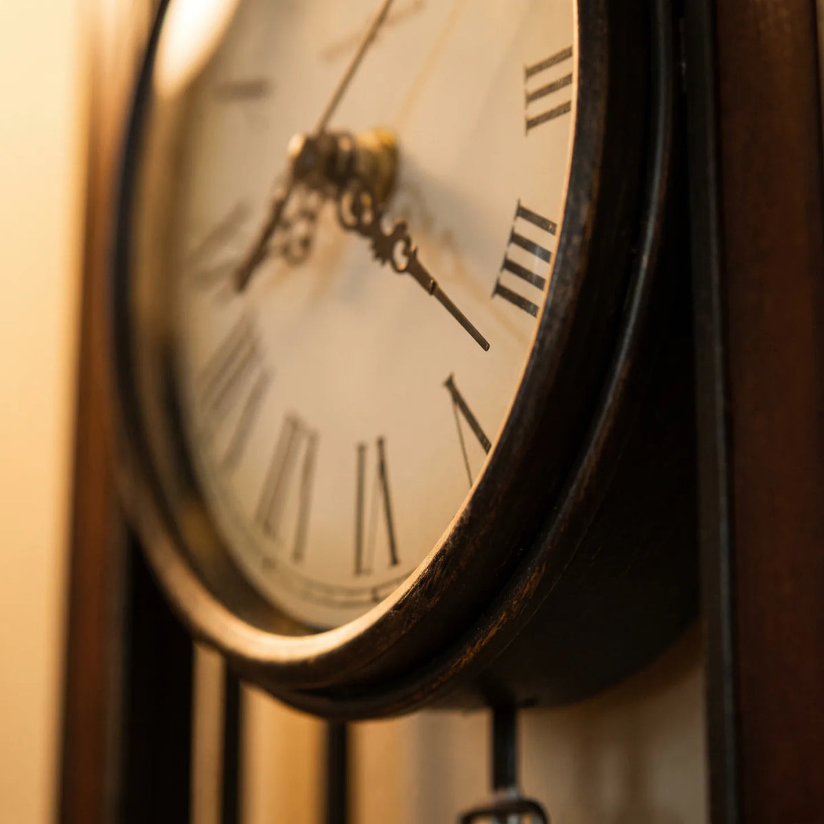 Howard Miller Carmen Wall Clock, macro close-up of the hands and dial