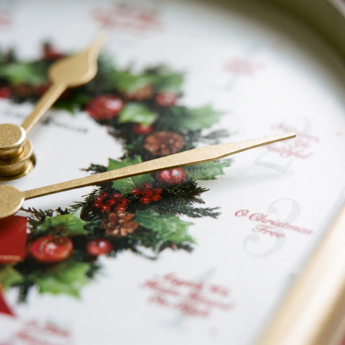 Howard Miller Carols Of Christmas II Tabletop Clock, macro close-up of the hands and dial