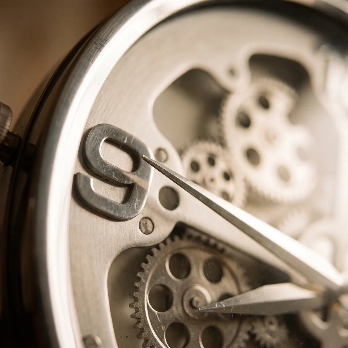 Howard Miller Caspian Tripod Grandfather Clock, macro close-up of the hands and dial