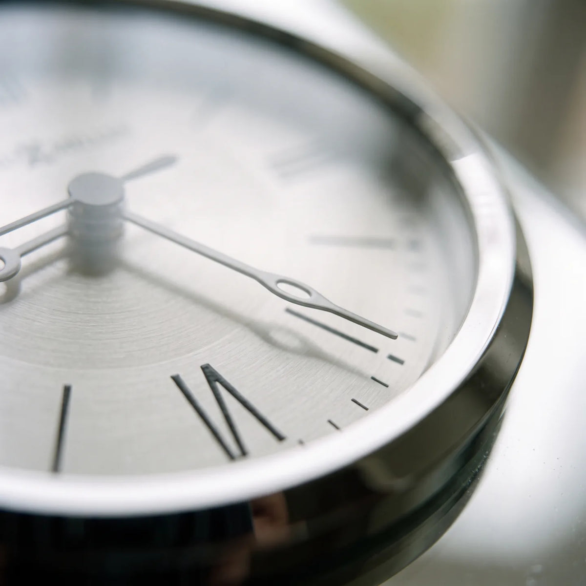 Howard Miller Donovan Tabletop Clock, macro close-up of the hands and dial
