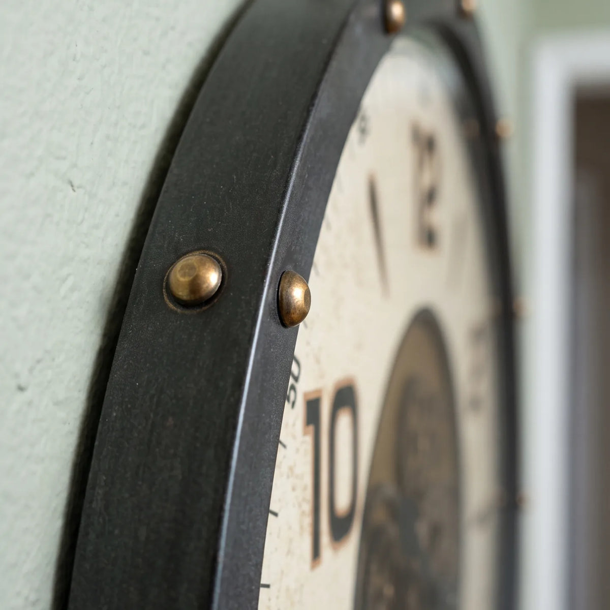 Howard Miller Garth Wall Clock, macro close-up of the hands and dial