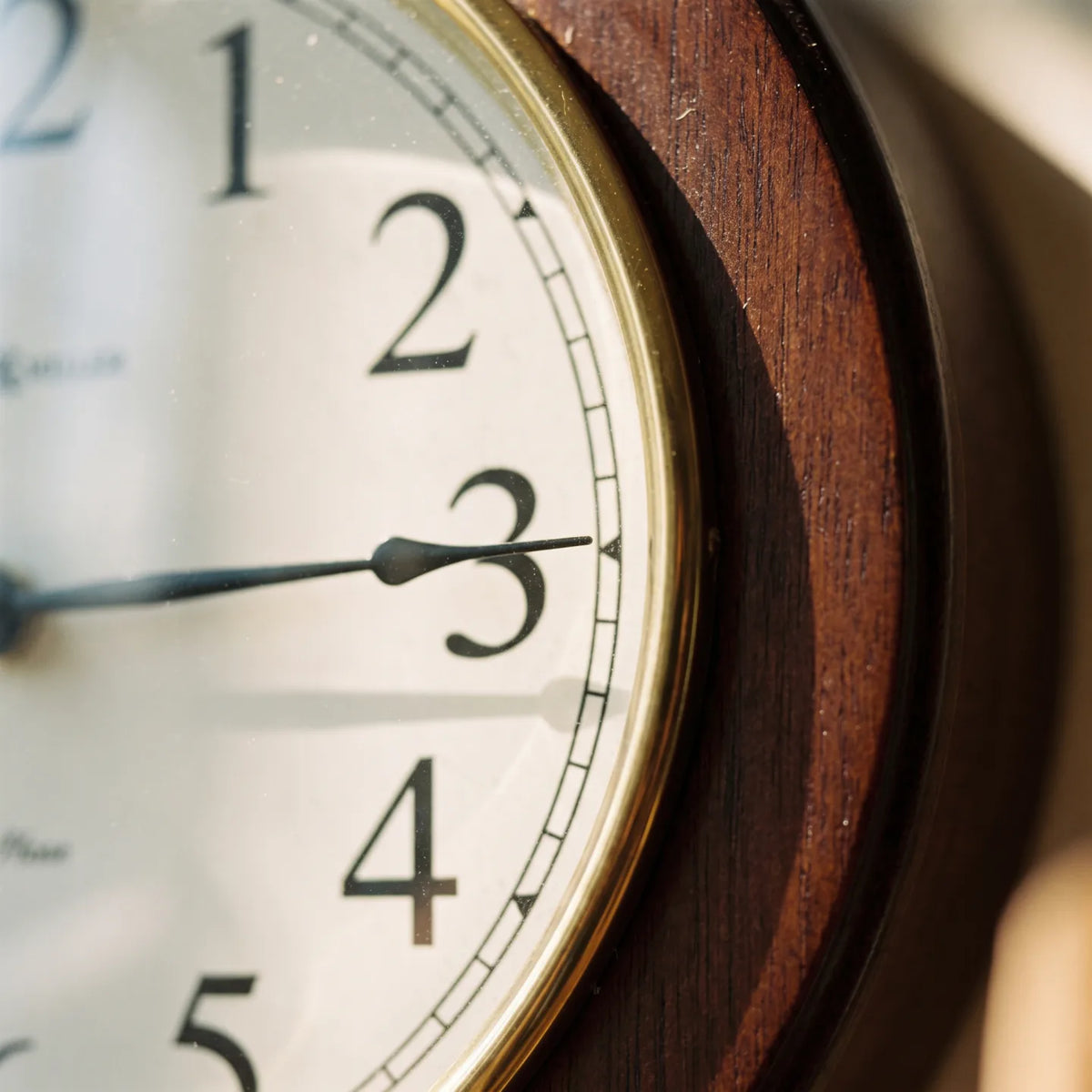Howard Miller Gerrit Wall Clock, macro close-up of the hands and dial