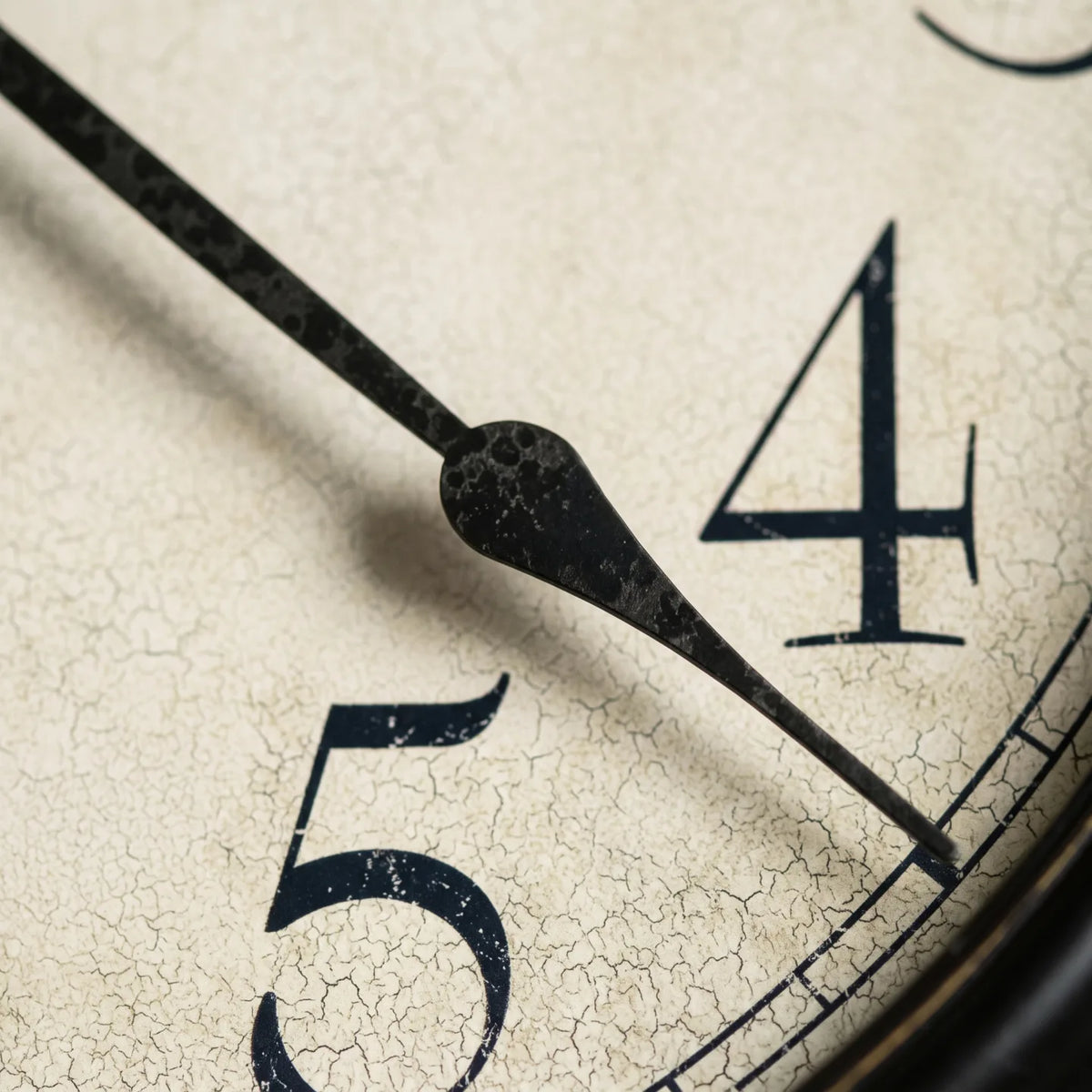 Howard Miller Glenwood Falls Wall Clock, macro close-up of the hands and dial