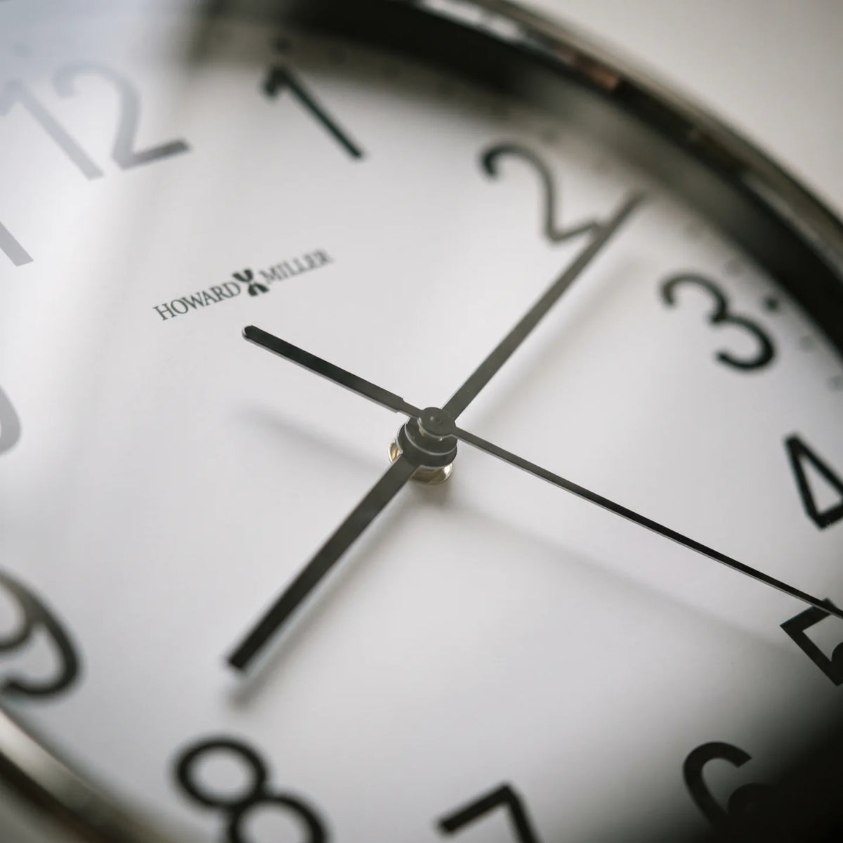 Howard Miller Hamilton Wall Clock, macro close-up of the hands and dial