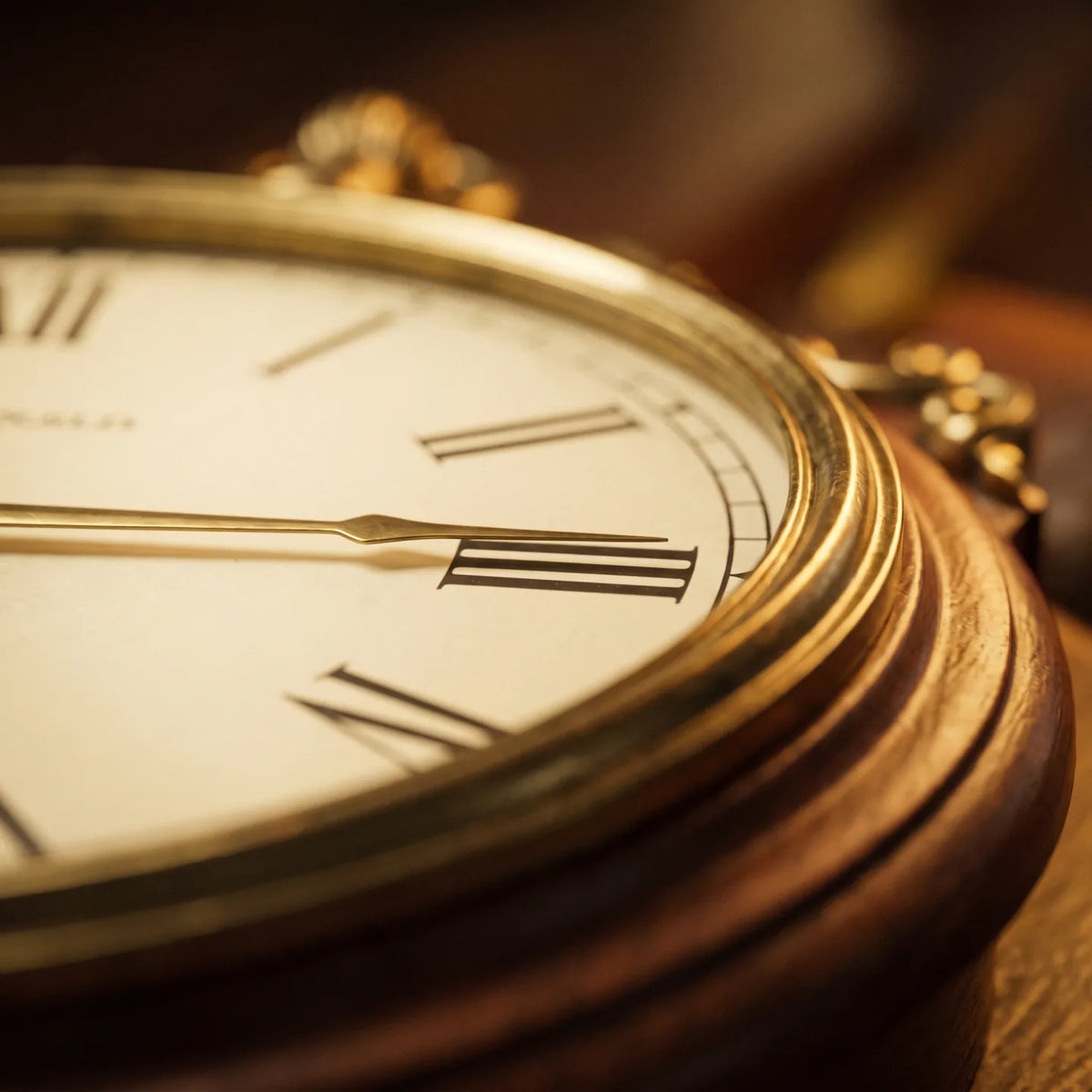 Howard Miller Henderson Wall Clock, macro close-up of the hands and dial