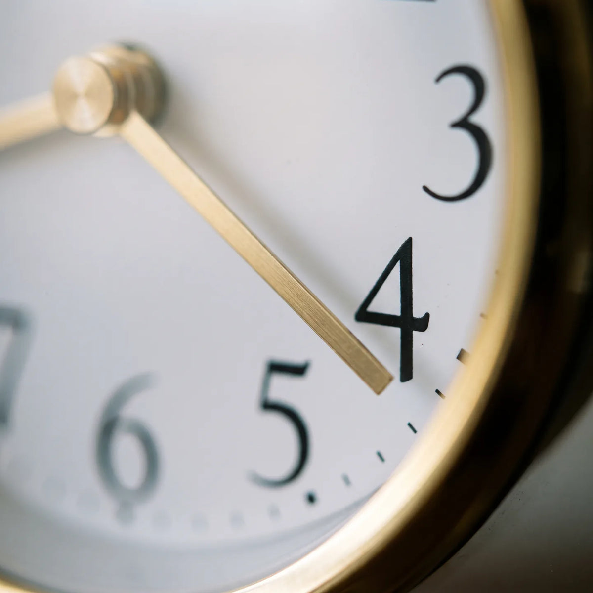 Howard Miller Imperial Tabletop Clock, macro close-up of the hands and dial
