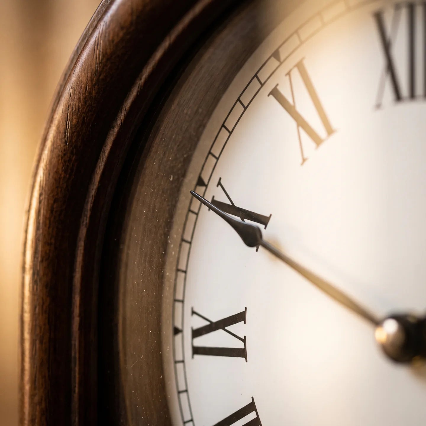 Howard Miller Lewisburg Wall Clock, macro close-up of the hands and dial