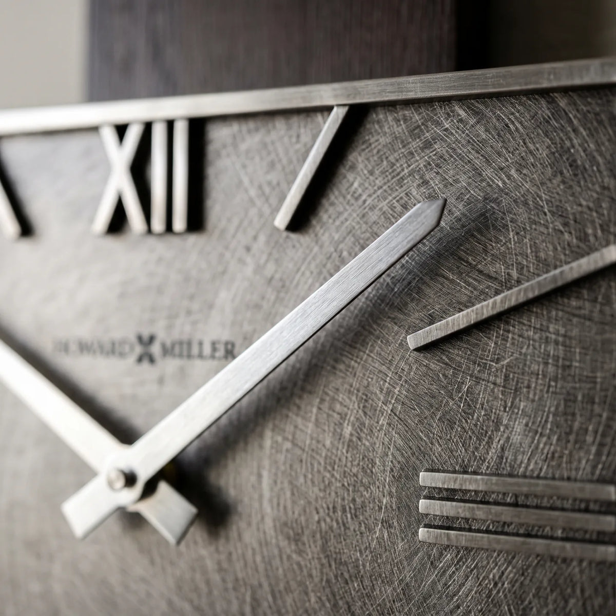 Howard Miller Maclane Wall Clock, macro close-up of the hands and dial