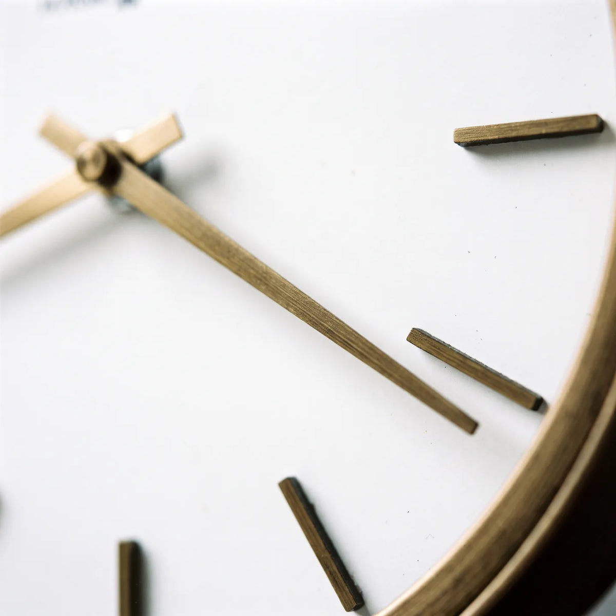 Howard Miller Mariam Accent Clock, macro close-up of the hands and dial