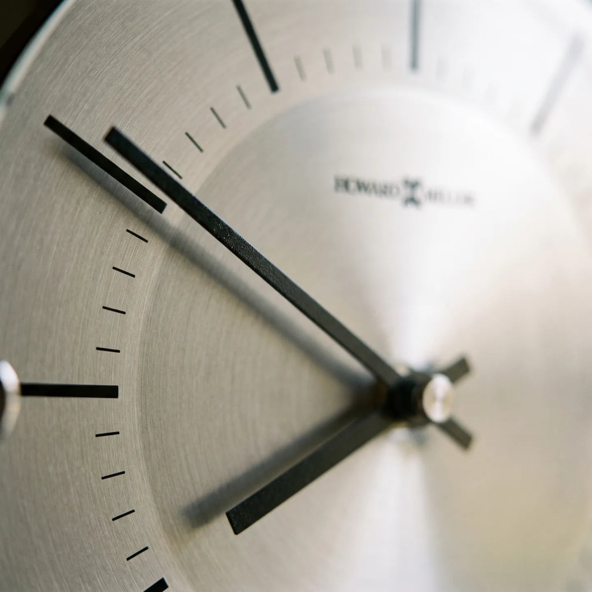 Howard Miller Mela Wall Clock, macro close-up of the hands and dial