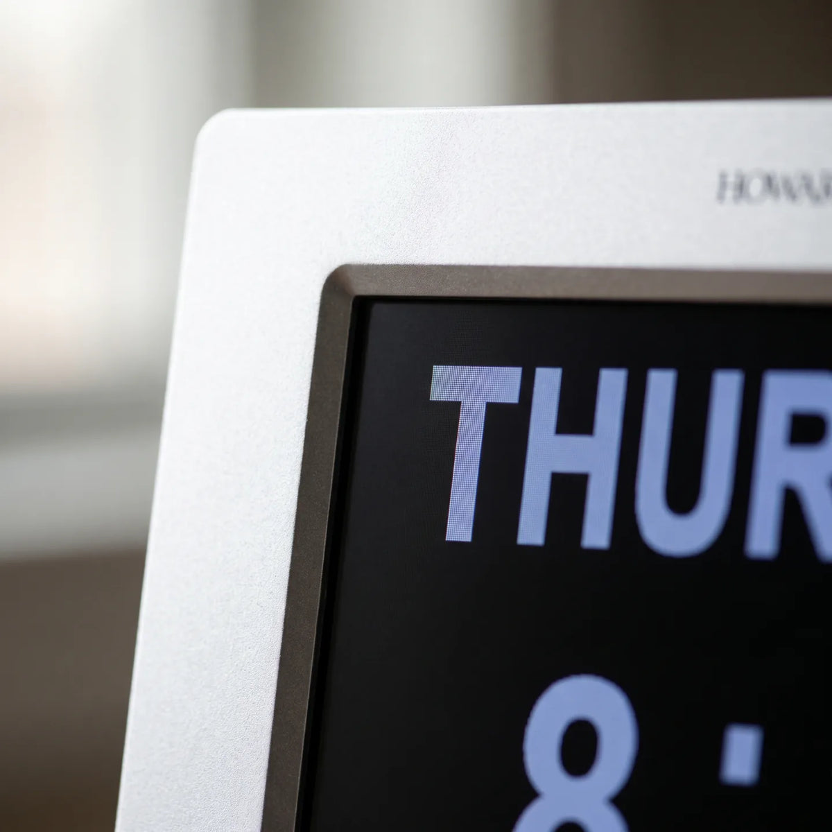 Howard Miller Memory Wall Clock, macro close-up of the frame and display