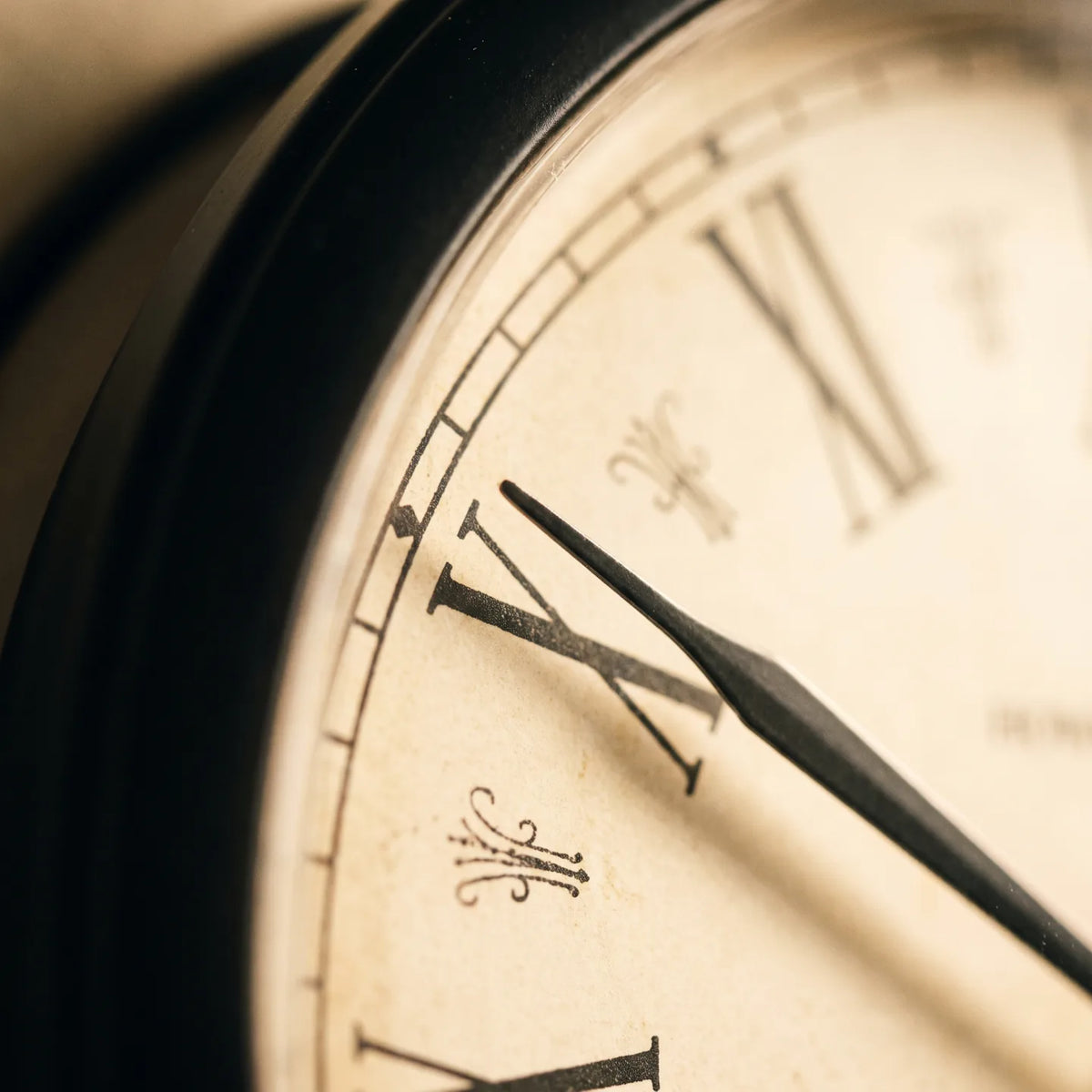 Howard Miller Paulina Wall Clock, macro close-up of the hands and dial