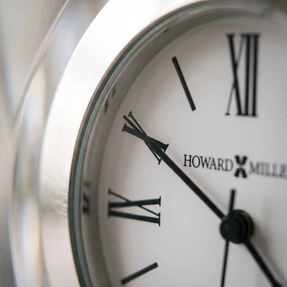 Howard Miller Quest Tabletop Clock, macro close-up of the hands and dial