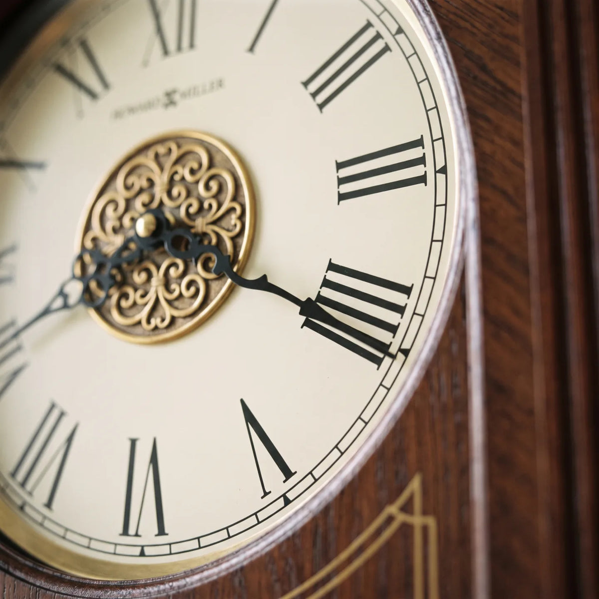 Howard Miller Sinclair Wall Clock, macro close-up of the hands and dial