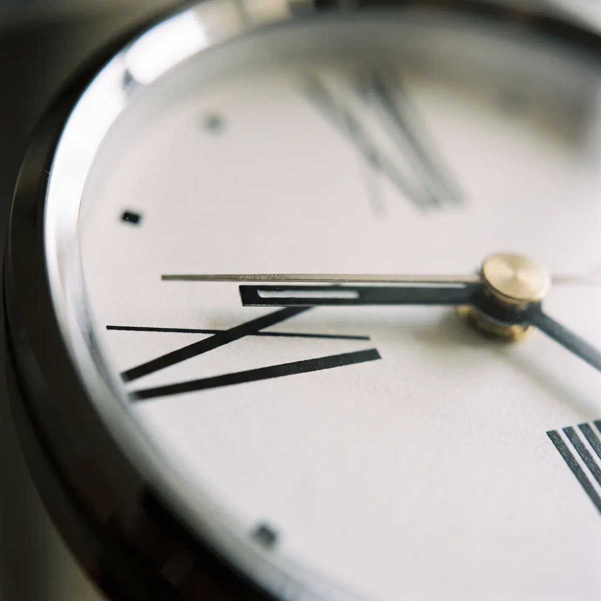 Howard Miller Tribeca Tabletop Clock, macro close-up of the hands and dial