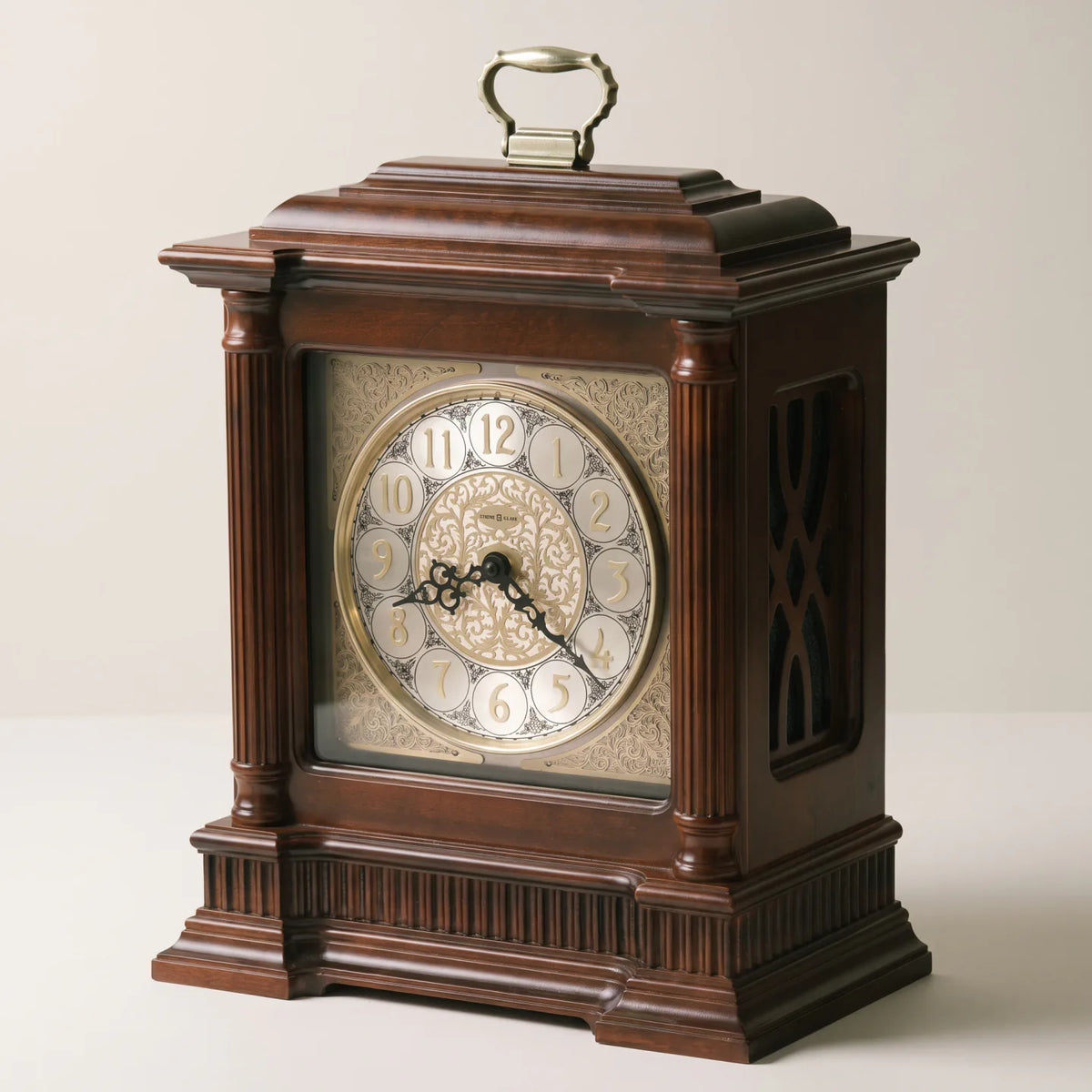 Howard Miller Akron Mantel Clock, 16-inch, front view on a plain white background