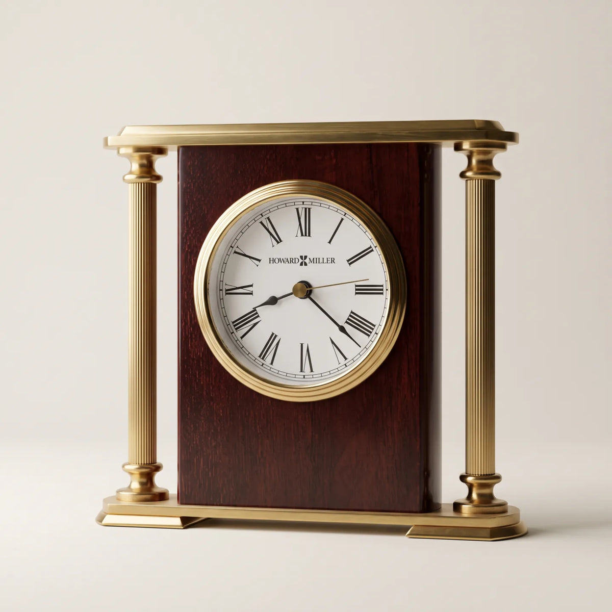 Howard Miller Rosewood Encore Bracket Tabletop Clock, 7-inch, front view on a plain white background
