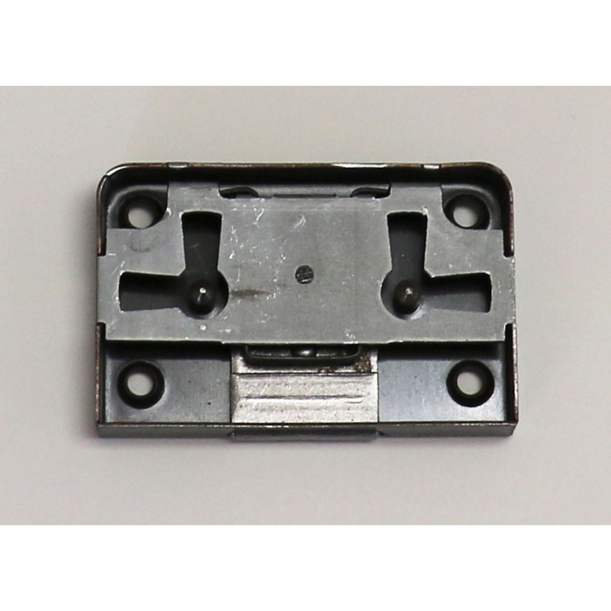 Close-up of a metal latch mechanism with mounting holes.