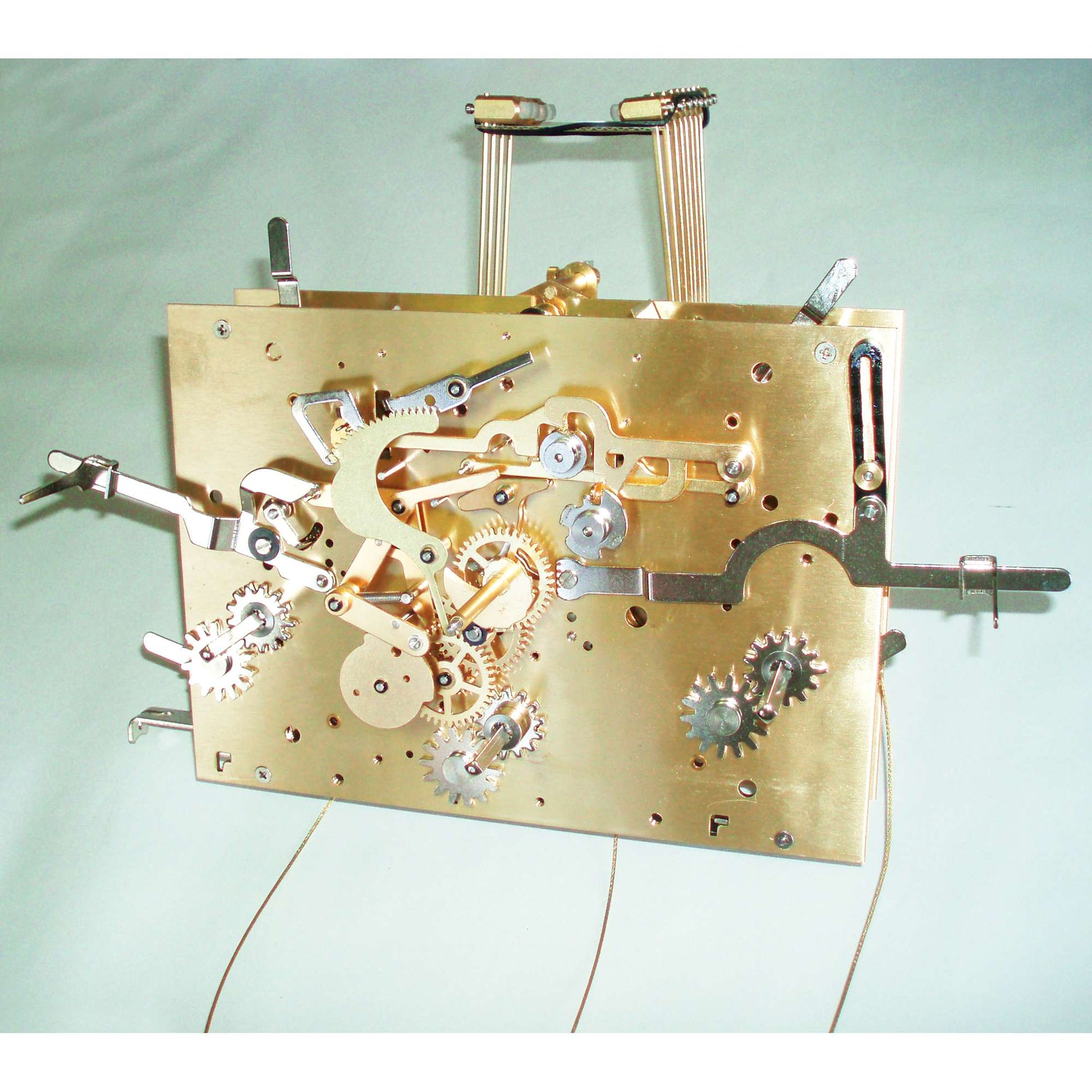 A detailed view of a mechanical clock movement with gears and levers.