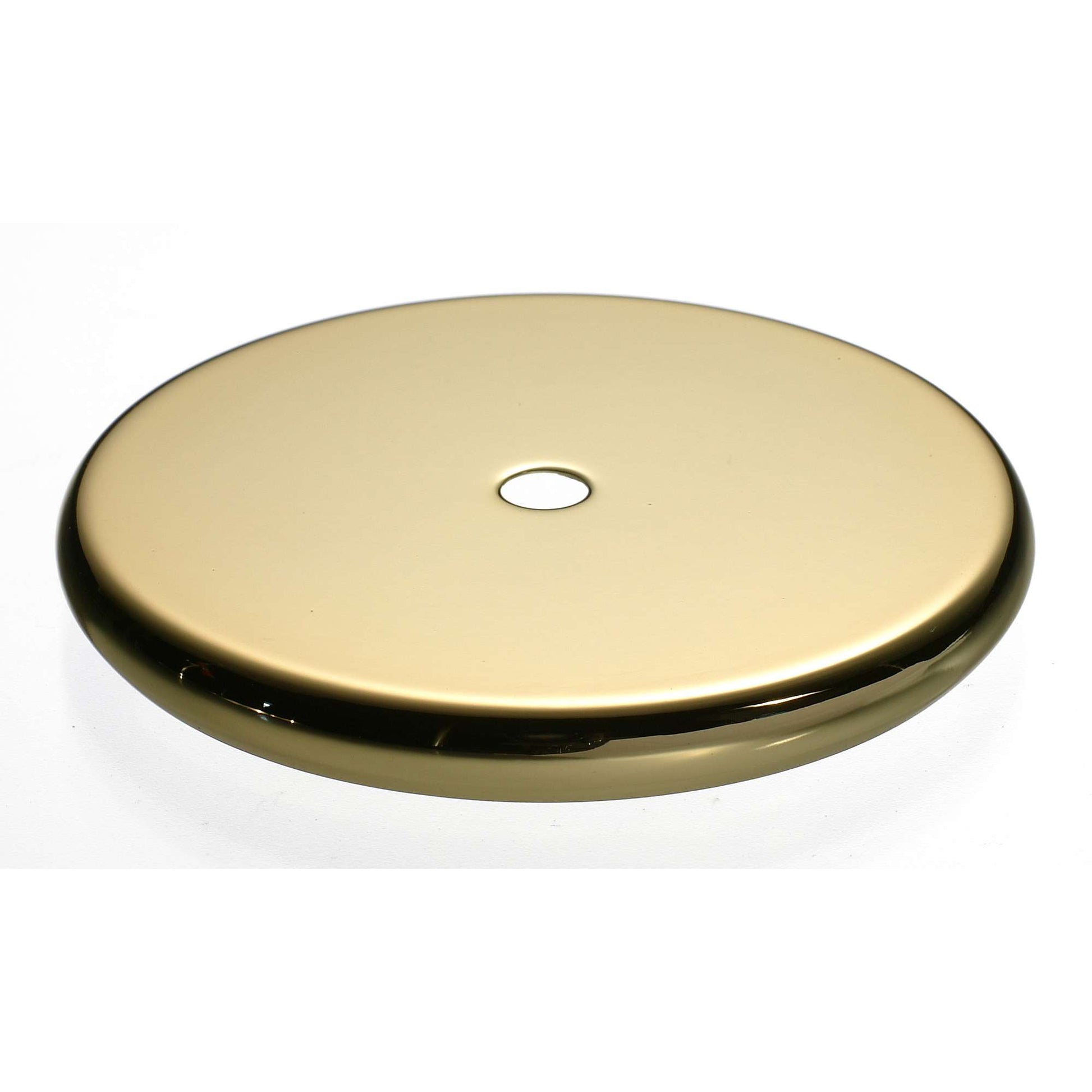 A shiny, oval-shaped gold plate with a small hole in the center.