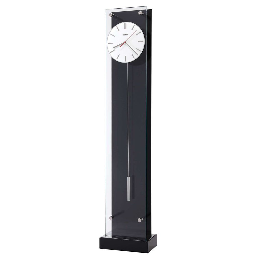 Modern pendulum wall clock with a minimalist design.