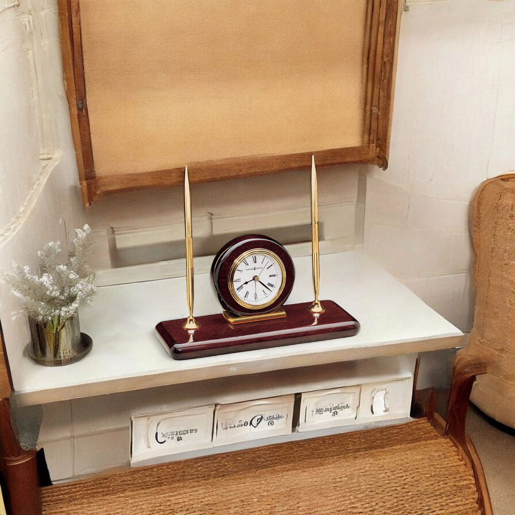 Classic desk clock on a white table with decorative items