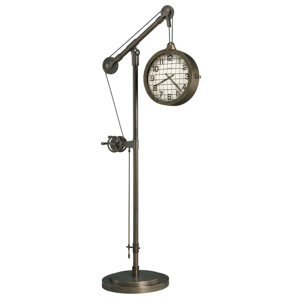 Industrial-style floor clock with a metal arm and base.