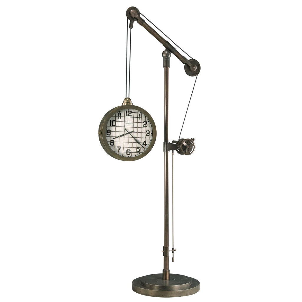 A vintage-style wall clock suspended from a metal stand.