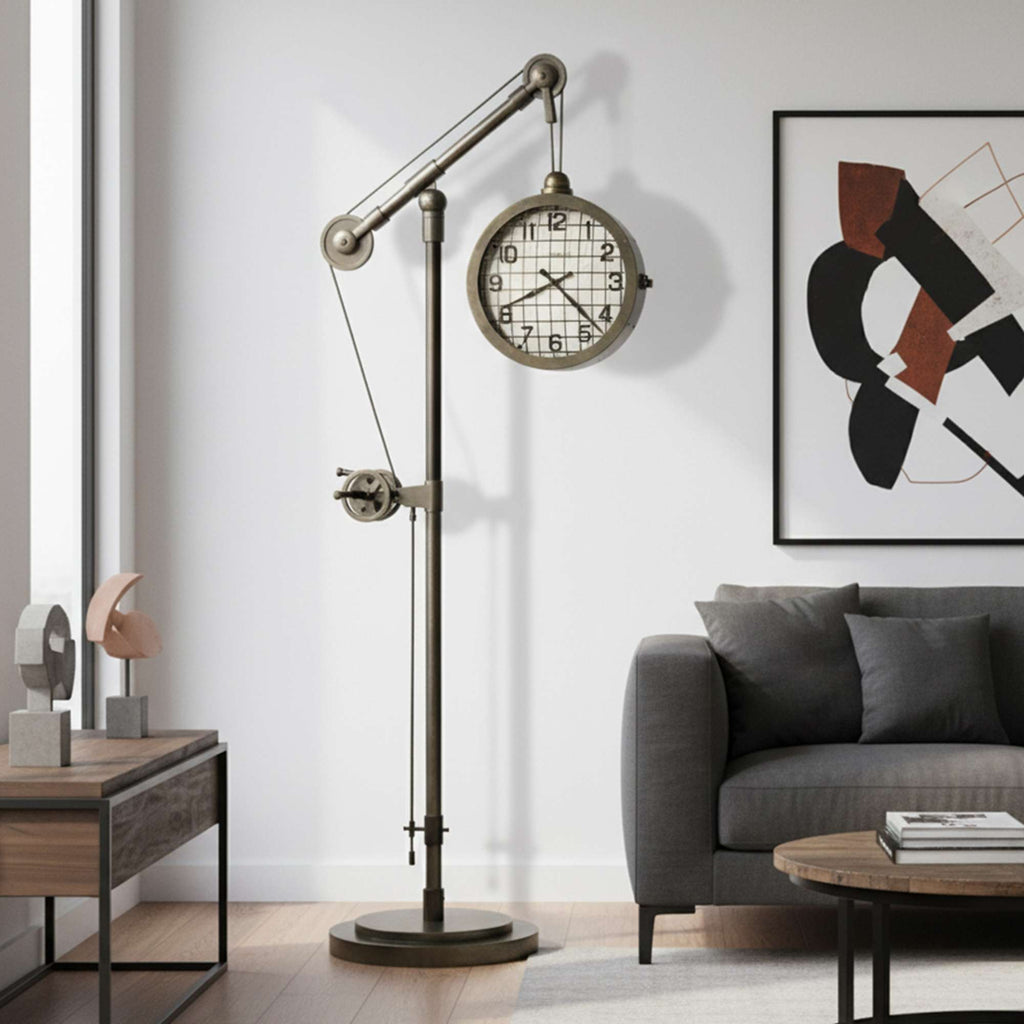 A modern living room featuring a stylish floor clock and contemporary artwork.