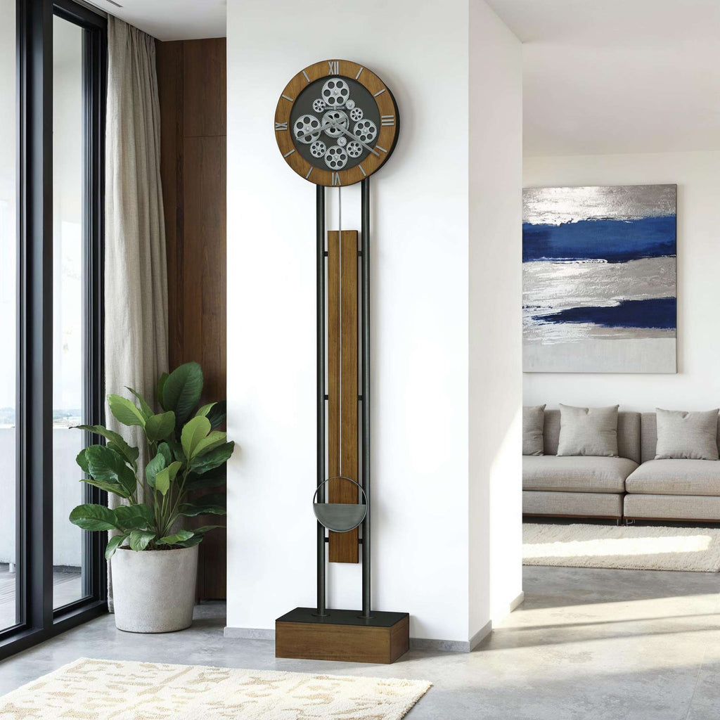 Modern wall clock with wooden accents in a stylish living room setting.