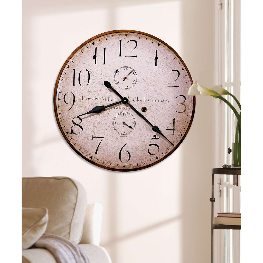 Vintage wall clock with a distressed face and large black numbers