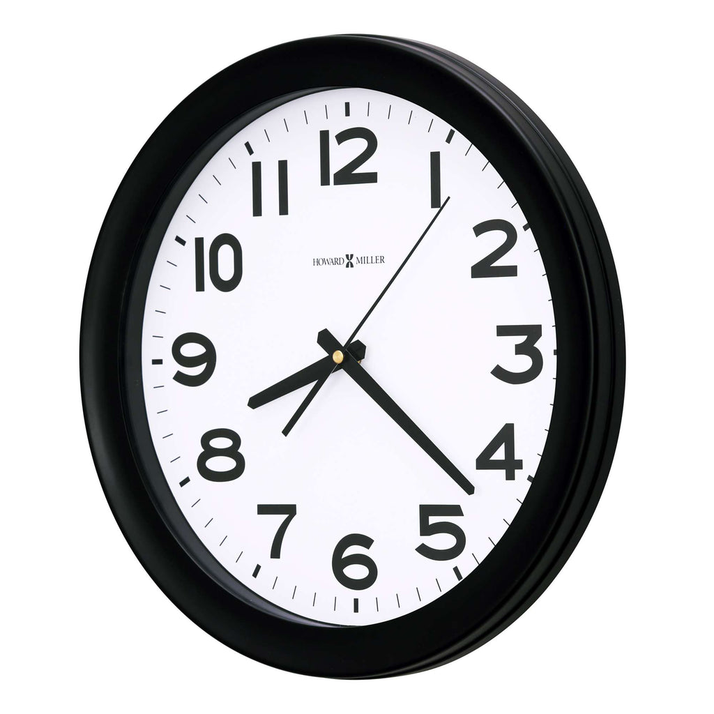 A round wall clock with black frame and large black numbers on a white background.