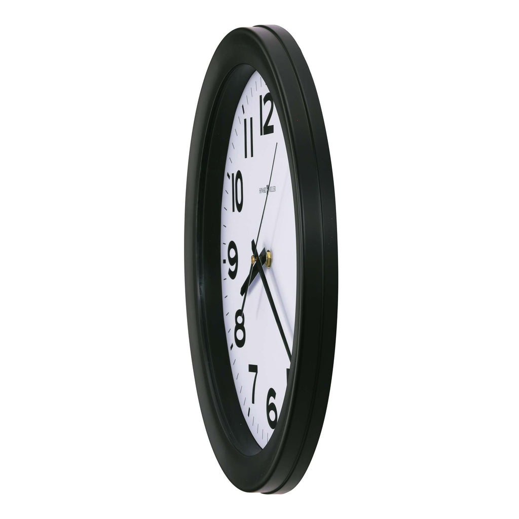 Black wall clock with a white face and black numbers