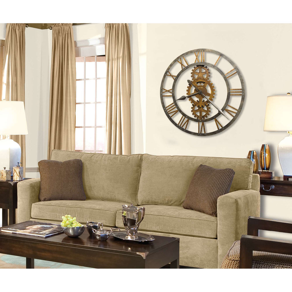 Cozy living room with a beige sofa, a decorative wall clock, and a wooden coffee table.