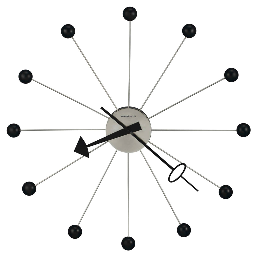 Mid-century modern wall clock with black and silver design.