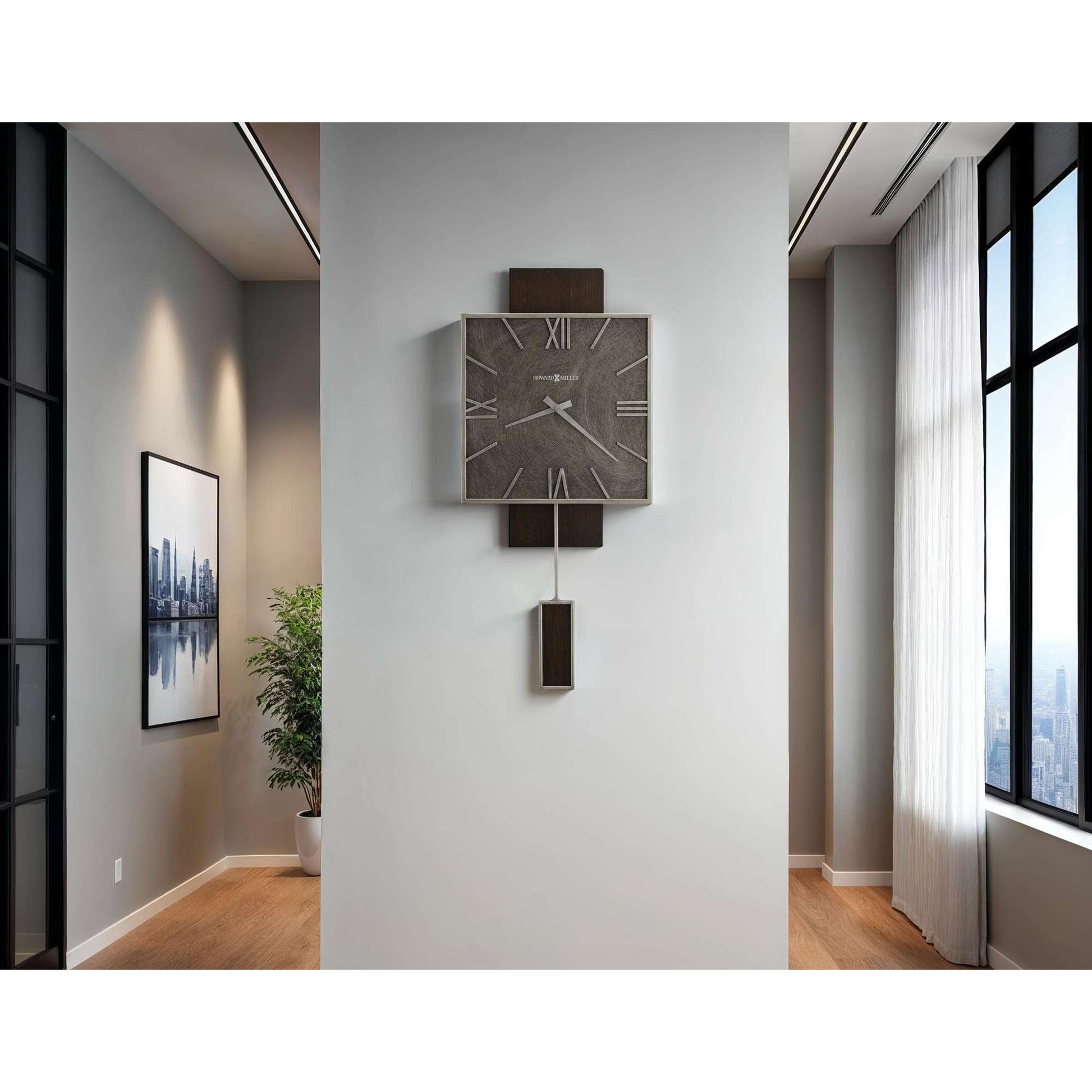 Modern wall clock hanging in a bright, minimalist interior