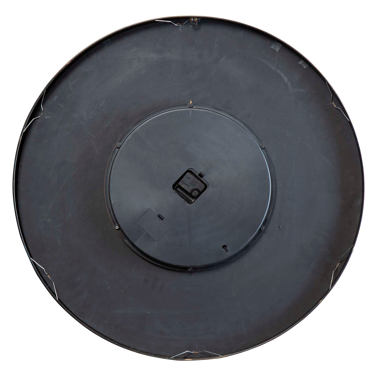 Top view of a circular black object with a central mounting area.