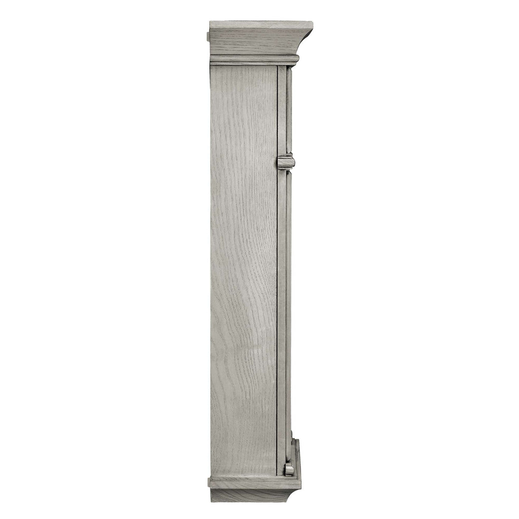 Vertical wooden cabinet door in a light gray finish