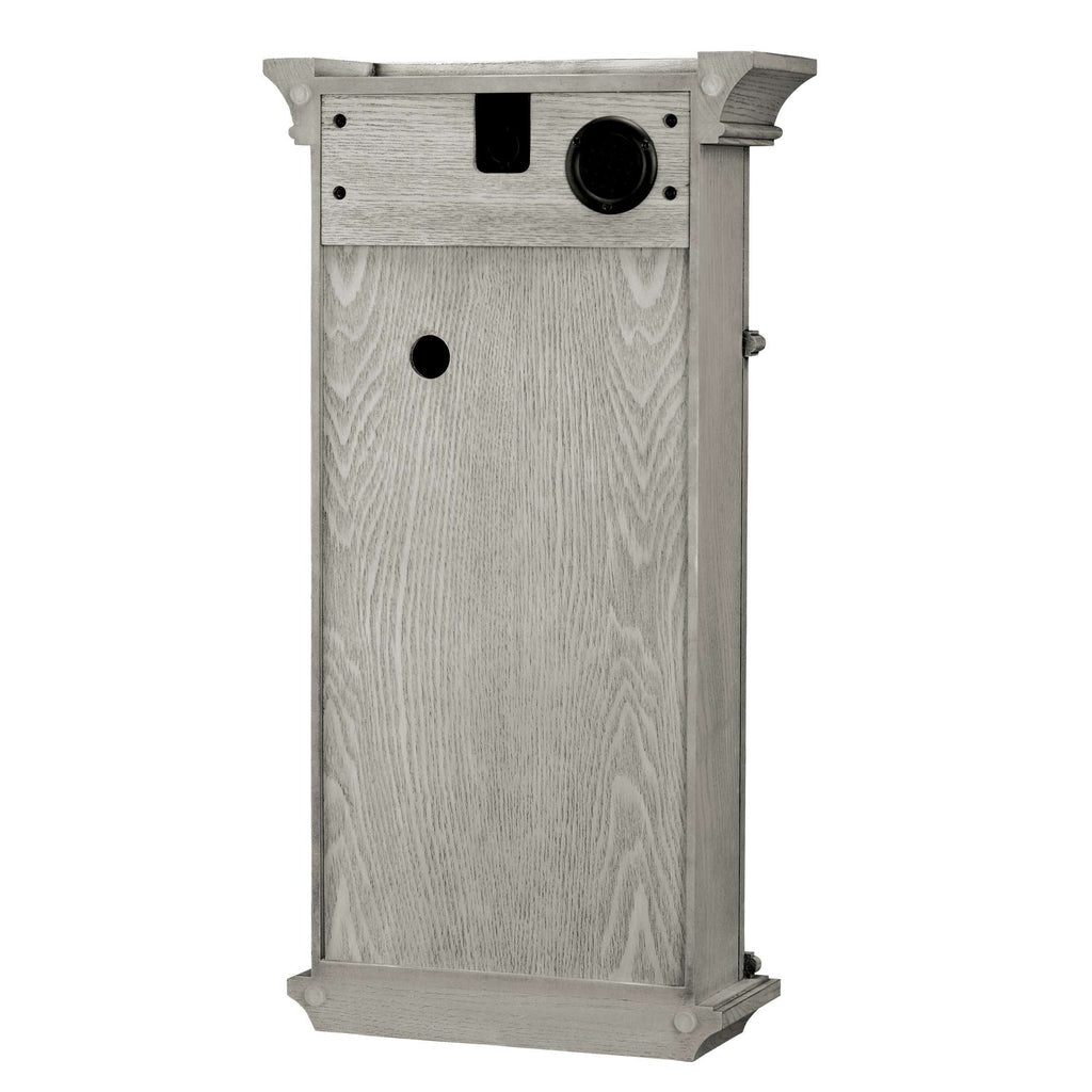A tall, gray wooden piece of furniture with various openings.