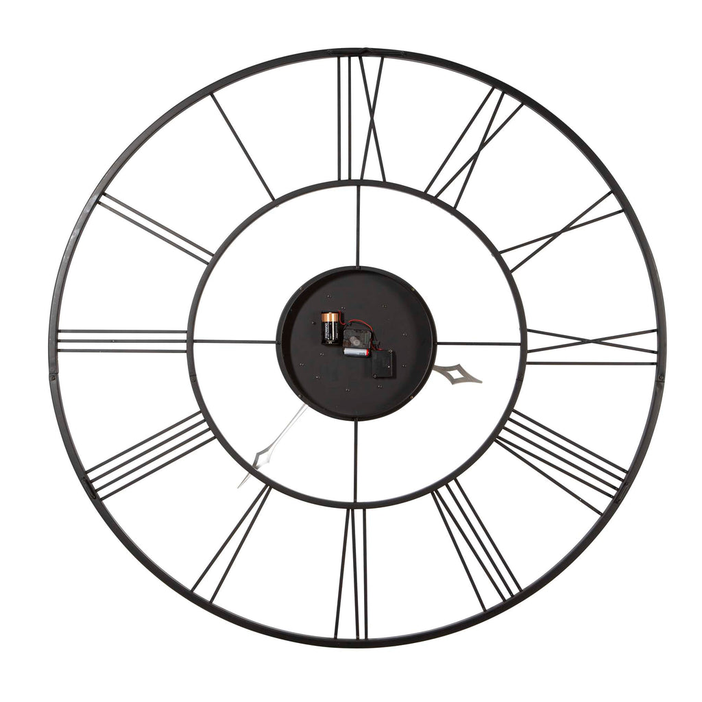 A stylish round wall clock with Roman numerals and a minimalistic design.