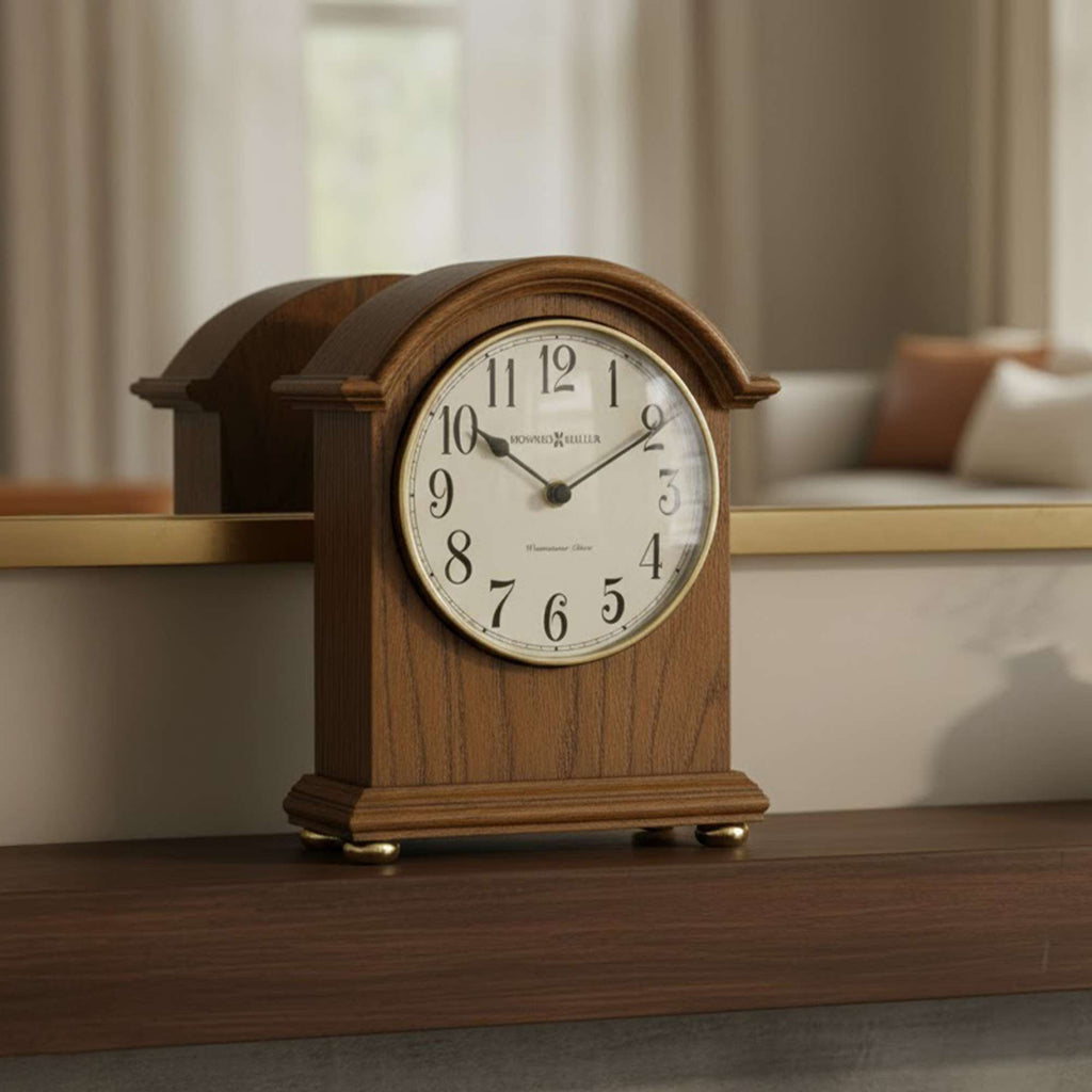A classic wooden clock displayed on a shelf.