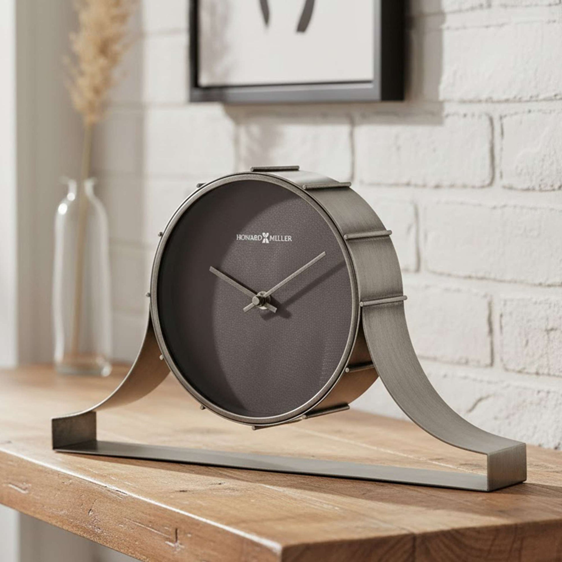 Modern clock on a wooden table with a minimalist design.