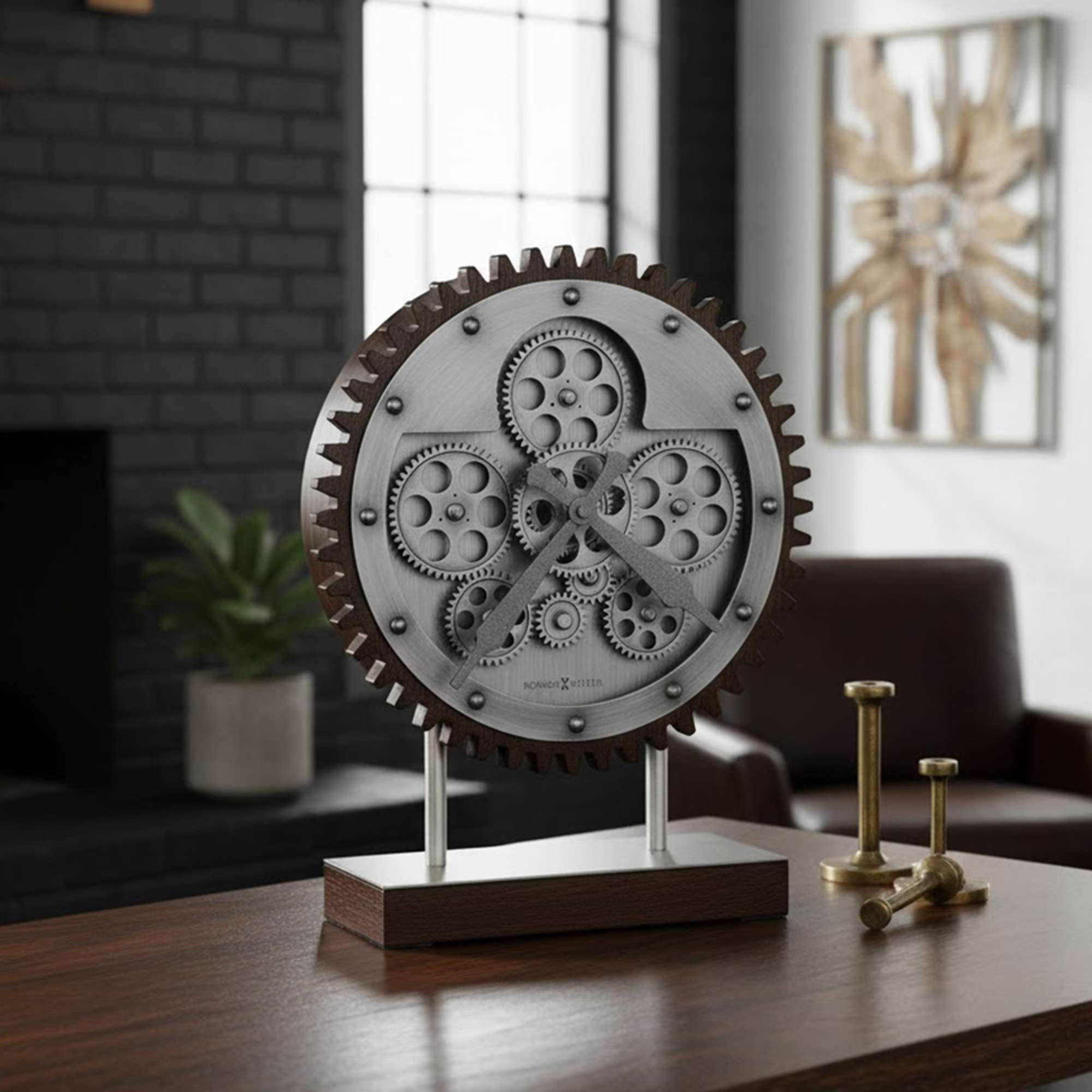 A decorative metal gear sculpture on a wooden base, displayed in a modern interior setting.